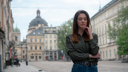 Fototapeta premium Outdoor close up portrait of young beautiful fashionable woman