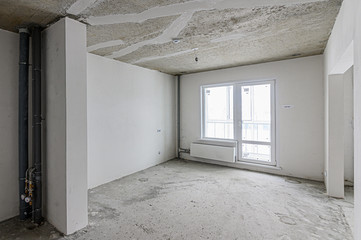 Russia, Moscow- January 15, 2020: interior room apartment modern bright cozy atmosphere. rough repair for self-finishing. interior decoration, bare walls of the room, stage of construction