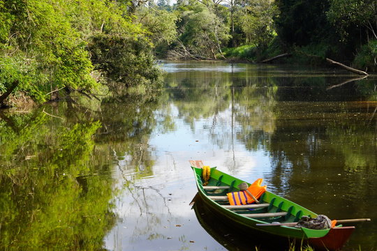 Rowing boat with a jetty on the river,Nature of water bodies
