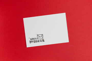 Blank love message card against red background