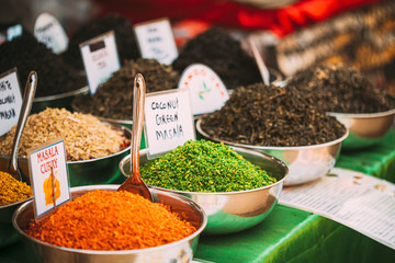 Canacona, Goa, India. Close View Of Coconut Green Masala And Masala Curry, Bright Green And Orange Color Fragrant Seasoning, Condiment In Tray On Local Food Market, Bazaar