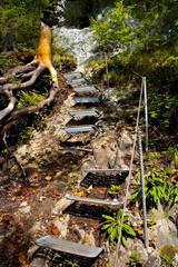 Special stairs, steel ropes for holding on attractive tourism in the Slovak Paradise.