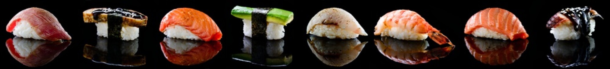 set of sushi nigiri set on black with reflection