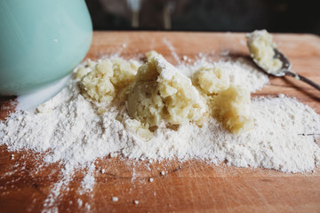 Mixing potato with flour to make gnocchi 