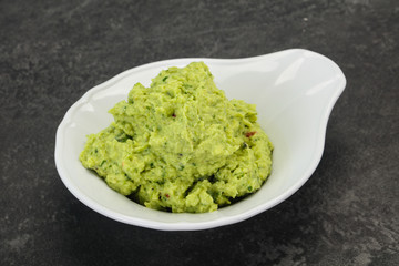 Avocado guacamole sauce with chili pepper