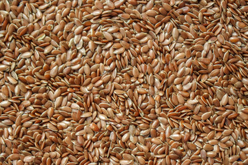 Flax seeds background top view
