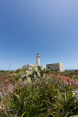Old lighthouse on the rocks in Capo Murro di Porco near Siracusa - Sicily