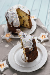 An Easter cake. Delicious dessert. Traditional holiday cake. On a table made of turquoise boards. Festive still life.