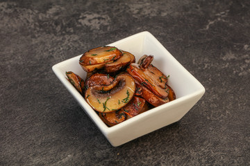 Roasted champignon with herbs and spices