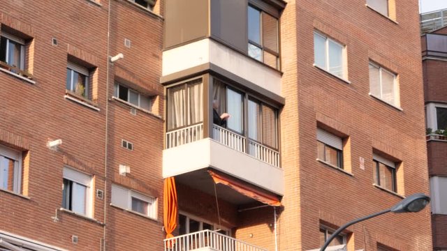 Madrid / Spain-04/19/20  PEOPLE APPLAUDING TO THE HEALTHCARE PROFESSIONALS IN MADRID FROM THEIR WINDOWS, DURING THE COVID 19 PANDEMIC IN 2020