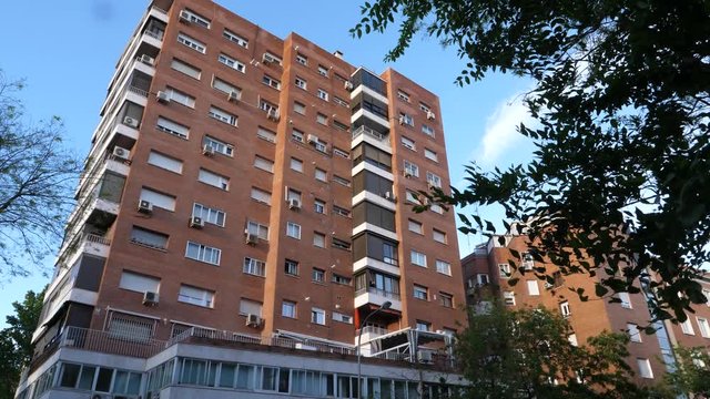 Madrid / Spain-04/19/20  PEOPLE APPLAUDING TO THE HEALTHCARE PROFESSIONALS IN MADRID FROM THEIR WINDOWS, DURING THE COVID 19 PANDEMIC IN 2020