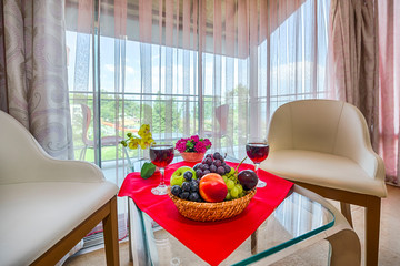 Home-made wine glasses, fruit plate, fruit cocktail