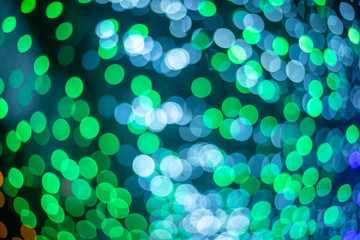 Blurred bokeh de-focus of colorful  lighting in Christmas festival celebration