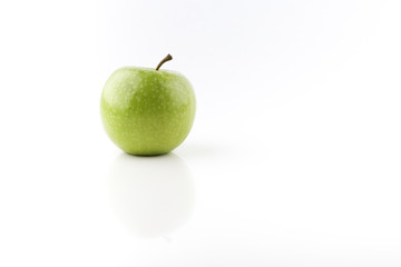 green apple on white background close up