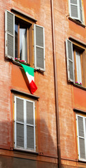 Italian flag of a window in Modena, Italy