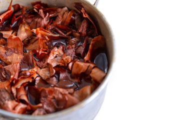 Boiling onion peels for painting eggs for Easter