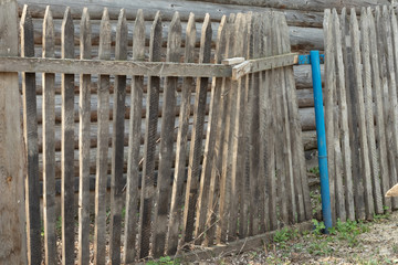 broken old fence. wooden fallen old fence

