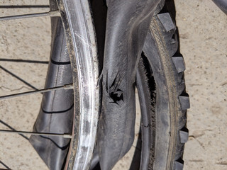 Fototapeta na wymiar Mountain bike with flat tire