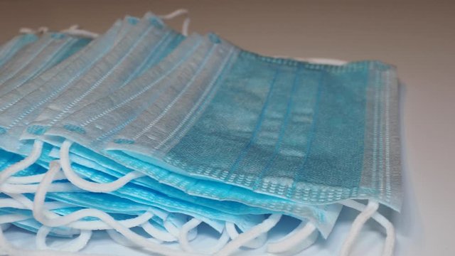 Set of medical and surgical masks. Disposable face mask protective against coronavirus, Covid-19, pollution, virus, and flu. Health care and surgical concept