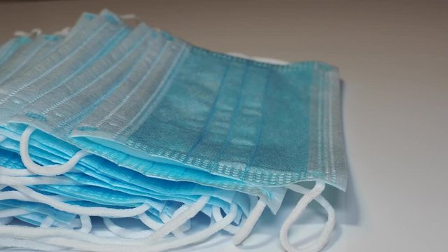 Set of medical and surgical masks. Disposable face mask protective against coronavirus, Covid-19, pollution, virus, and flu. Health care and surgical concept
