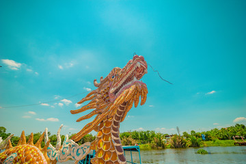 view of Phu Chau Temple, is located in the middle of a branch of the Saigon River, with a age of 3...