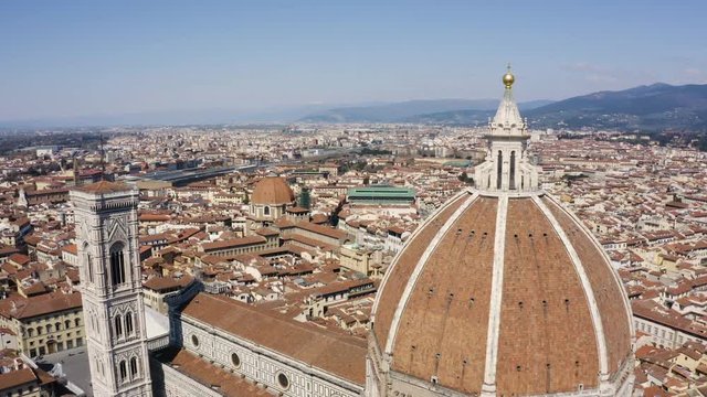 Aerial video of Cathedral of Saint Mary of the Flower. Aerial view of Florence Duomo. Flying close to The Basilica di Santa Maria del Fiore. Duomo, Florence, Tuscany, Italy.