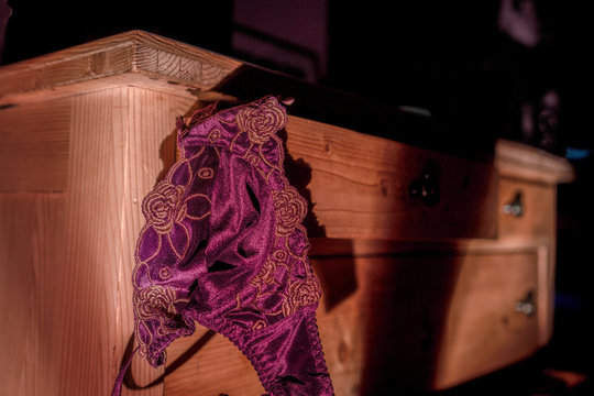 Spooky dark picture of a purple bra