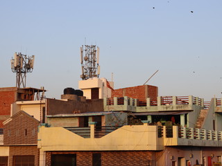 Mumbai, Maharastra/India- April 22 2020: A cellular mobile tower consisting of receivers and transmitters of the 4th generation placed on the rooftop.
