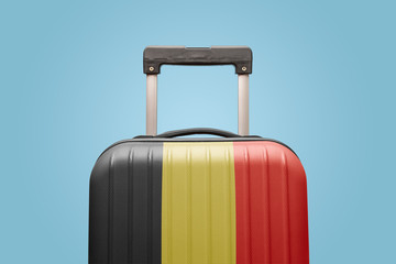 Baggage with Belgium flag print tourism and vacation concept.