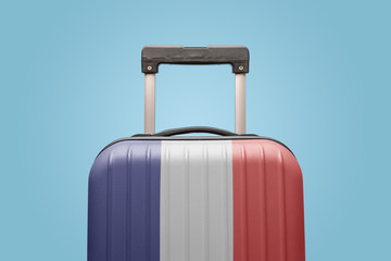 Baggage with France flag print tourism and vacation concept.