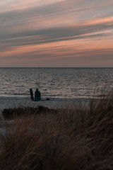 Fototapeta premium Angler am Strand