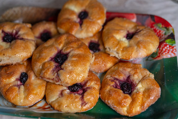 Sweet buns with cottage cheese and cherry