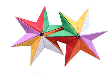 Two origami paper folding stars isolated white background