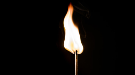 burning matches on a black background