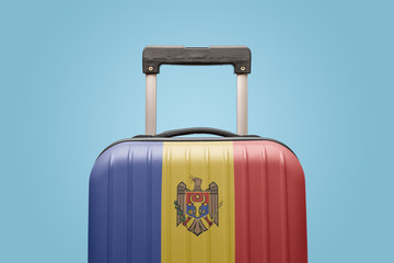 Baggage with Moldova flag print tourism and vacation concept.