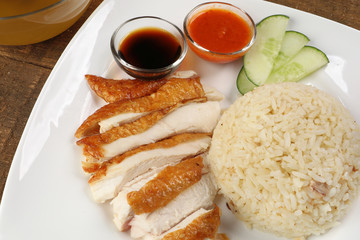 South east asian style chicken rice set steamed roasted sliced chicken with soup dark chilli sauce malaysia china