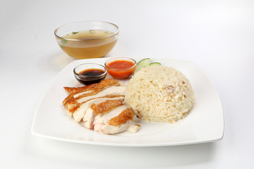 South east asian style chicken rice set steamed roasted sliced chicken with soup dark chilli sauce malaysia china