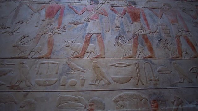 Egypt color hieroglyphic showing abundance of Niles river people with food and farming