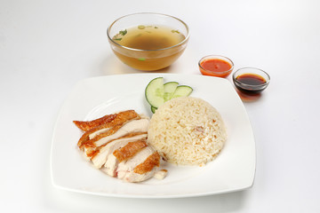 South east asian style chicken rice set steamed roasted sliced chicken with soup dark chilli sauce malaysia china