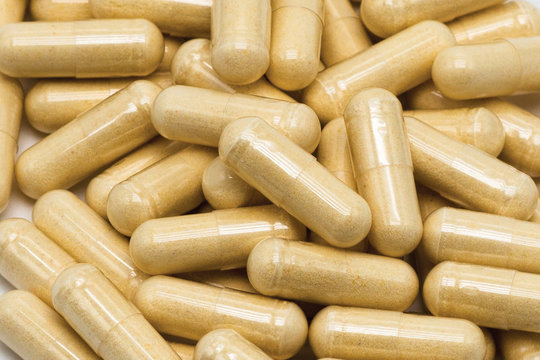 Vegetarian capsules on a light background