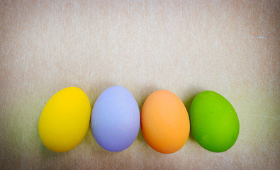Beautiful easter eggs on a vintage brown paper background