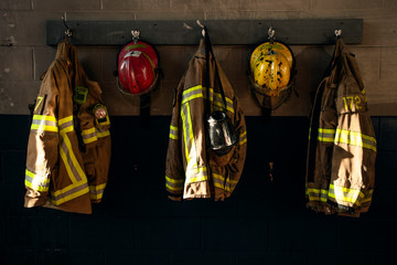Firefighter protection clothes hanging on the wall