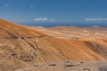 mountain landscape with blue sky and clouds
