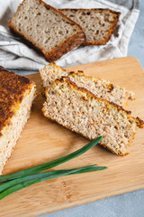 Homemade chicken and liver pate served on cutting board