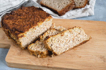 Homemade chicken and liver pate served on cutting board