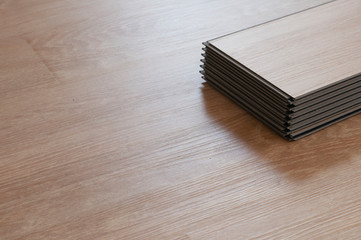 vinyl wood floor Installation for Interior design and renovate home. Home decoration with laminate vinyl wood floor.
