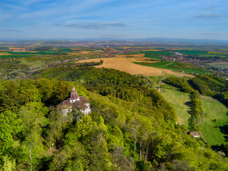 Fototapeta premium Aerial view of castle Buchlov and chapelle of st. Barbora in the Moravia landscape