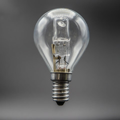 A close up of an unlit lightbulb 