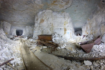 trolleys in an abandoned mine