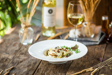 Italian pasta tagliatelle alfredo with mushrooms 